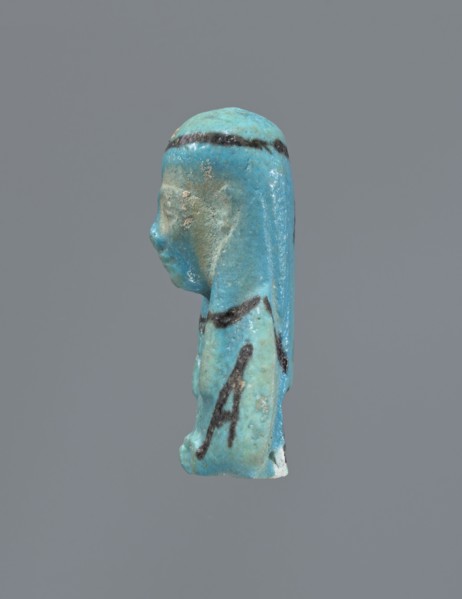 Ushabti, Mummy-shaped figurine, preserved head and fragment of torso. Arms crossed on the chest,