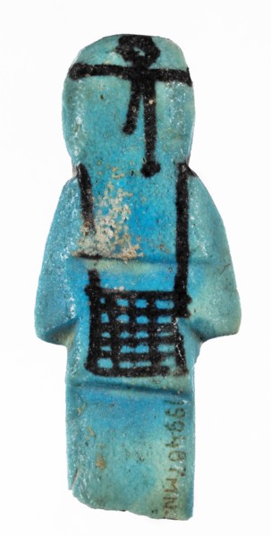 Shabti with baskets on the back, Mummy-shaped funerary figurine, preserved fragment from the knees