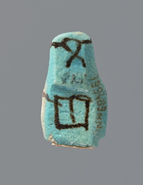 Ushabti, mummy-shaped figurine, preserved head and fragment of torso. Arms crossed on the chest,