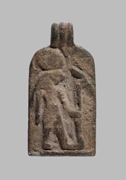 Amulet plaque with the figure of Re: plaque with a flat relief figure of a falcon-headed deity with