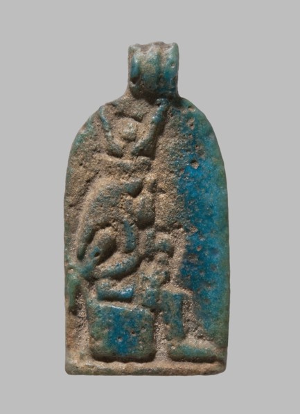 Plaque with a relief image of Isis sitting on a throne, turned to the right and holding infant