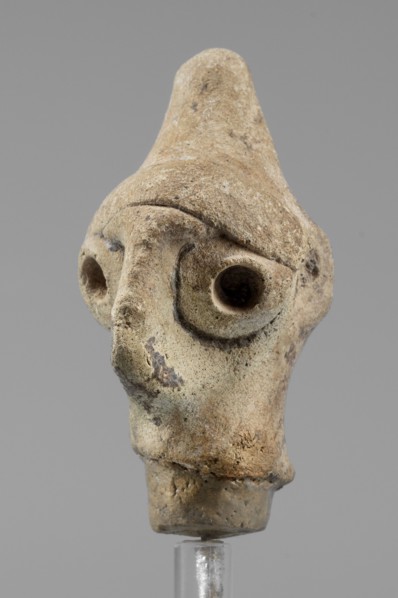 Idol head, unknown Syrian workshop, terracotta, idols, Northwestern Syria. Male head in a conical