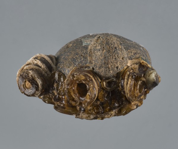 Apotropaic pendant in the shape of a male head; bearded head pendant; pendant in the form of a