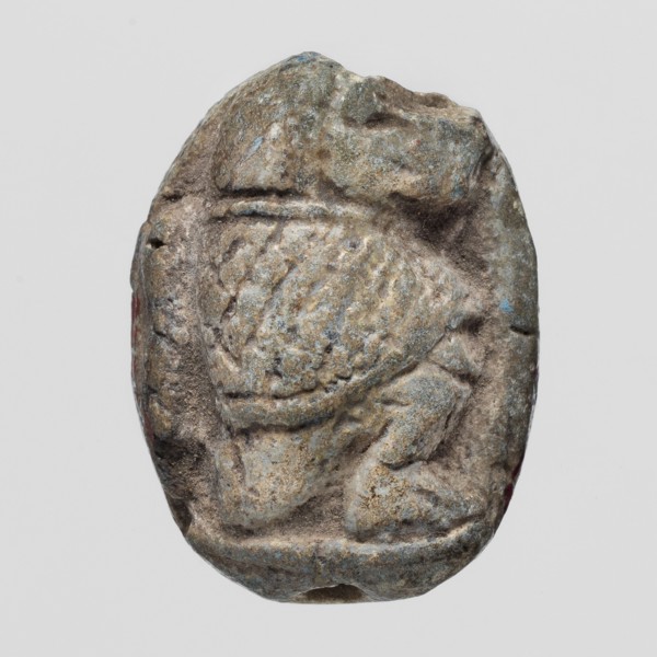 Scaraboid with a monkey. The upper surface of the scaraboid is decorated with a convex image of a