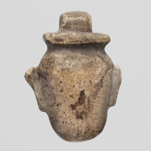 Amulet - heart ib; Amulet ib in the shape of a heart with a pendant at the top; maker, materials