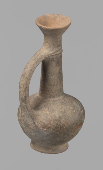 Jug. Cypriot pottery, Base Ring Ware I. Jug with an echinus-shaped foot; a biconical, slightly
