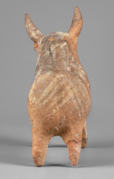 Bull-shaped vessel, Vessel in the shape of a bull standing on widely spaced legs. The cylindrical