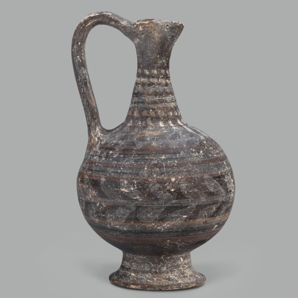 Oinochoe, unknown Cypriot workshop; Arsinoe Cyprus. Oinochoe on a cup-shaped foot with a spherical