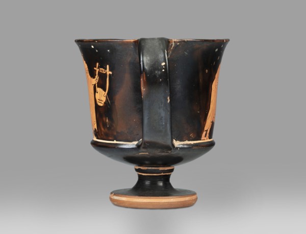 Red-figure kantharos with a depiction of an ephebe with an aryballos and a Greek inscription