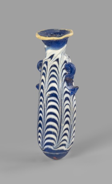 Alabastron, Egyptian workshop, 6th–5th century BC. Opaque dark blue glass alabastron decorated with