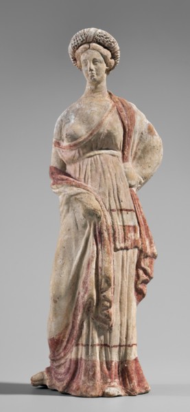 Figurine of a maenad, ca. 3rd–2nd century BC. A young woman standing in a wreath tied with a ribbon