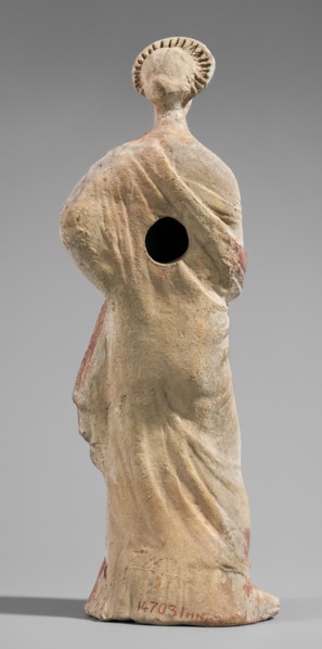 Figurine of a maenad. A young woman standing in a wreath tied with a ribbon is dressed in a chiton