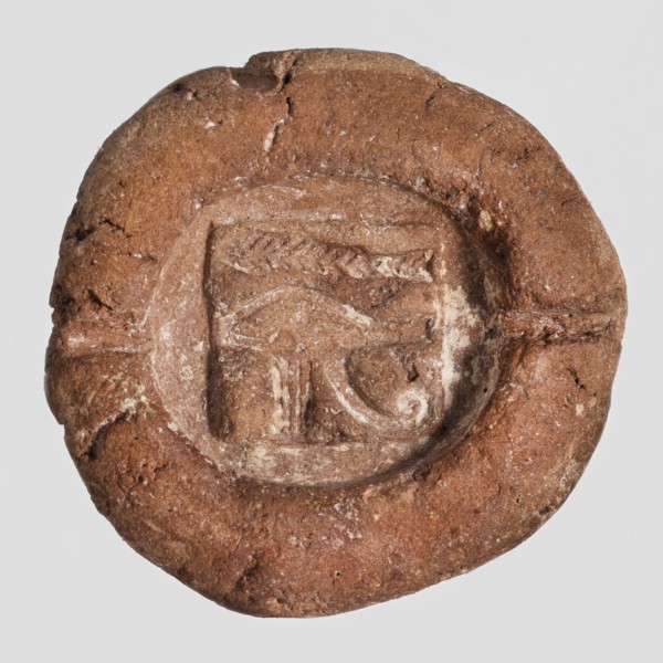 Mold for an amulet of the eye of Horus udjat. Hemispherical mold with a representation of the udjat