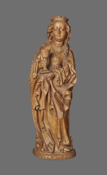 Figure of St. Barbara, sculptor unknown. Medieval wall sculpture, hollowed out from behind the head