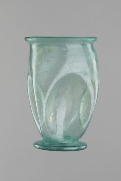 Glass cup, Egypt, 1st–2nd century AD. Isings form 32. Transparent bluish-green glass with slightly