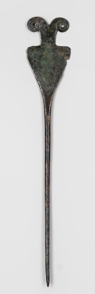 Pin, unknown Luristan workshop. Pin with a thin, oval shaft transitioning into a flat head composed