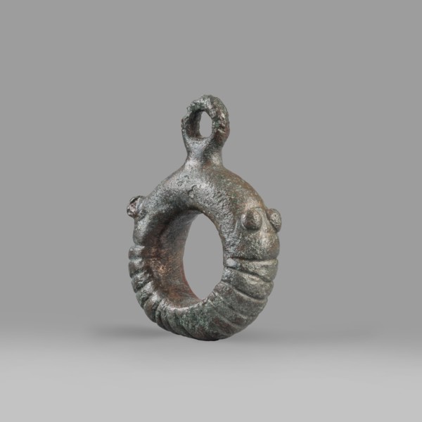 Decorative pendant from a horse harness, unknown Near Eastern workshop. The pendant is in the form