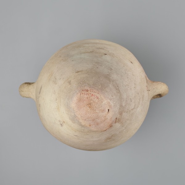 Large amphora with an ovoid shape and a rounded foot. Two small vertical vices placed on the body
