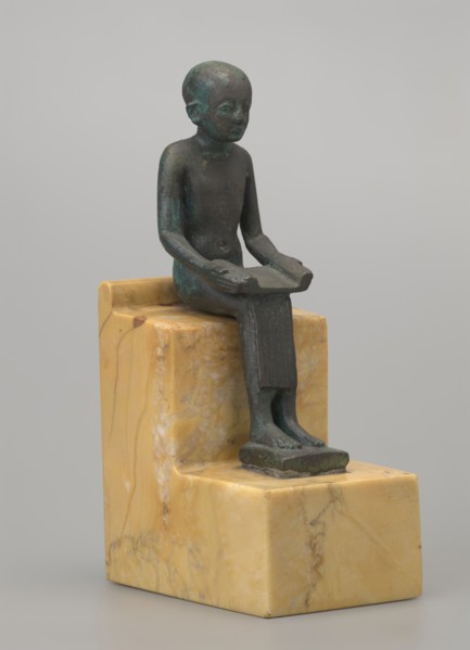 Figurine of Imhotep, Imhotep ca. 2667–2648 BC; mythology. Figurine of a seated Imhotep holding an