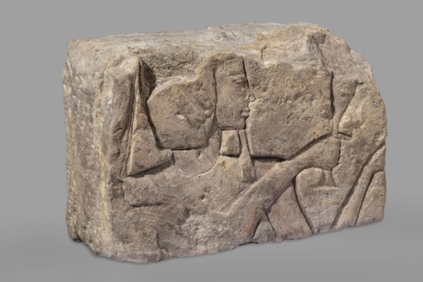 Relief depicting Ramesses II with a ritual vessel; uraeus on wig; hes vase and possible incense