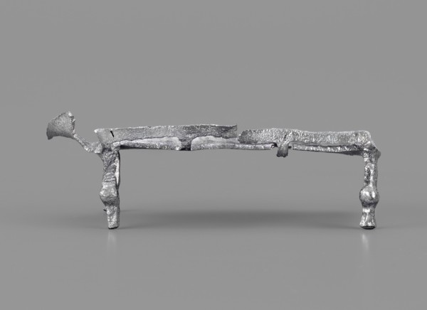 Miniature bed, votive offering or model of furniture; rests on four legs formed from square bars