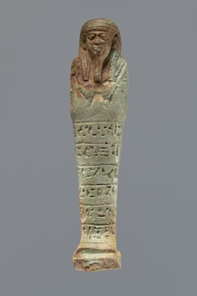 Ushabti, Mummy-shaped figurine, funerary shabti, 664–332 BC Late Period, Egypt. Standing on a base,