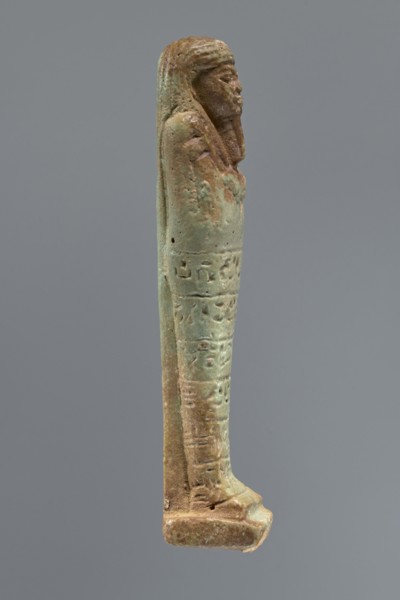 Ushabti, Mummy-shaped figurine, funerary shabti, 664–332 BC Late Period, Egypt. Standing on a base,