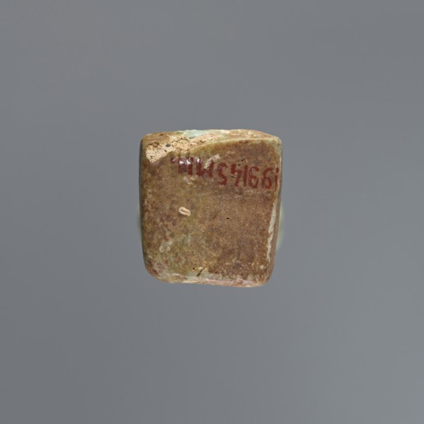Ushabti, mummy-shaped figurine, funerary gift, hoes. Mummy-shaped figurine standing on a base,