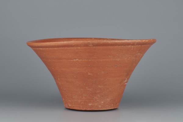 Deep, cup-shaped bowl with a slightly convex bottom and sides arching upwards; straight, flat,