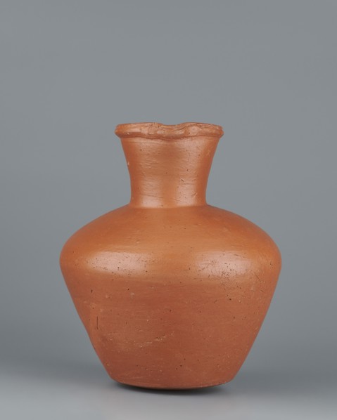 Jug. Medium-sized biconical clay jug, widest at about half its height with wide, sloping shoulders.