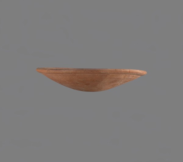 Bowl, Low bowl with a rounded bottom and a widening rounded rim. Nile clay, fine-grained,