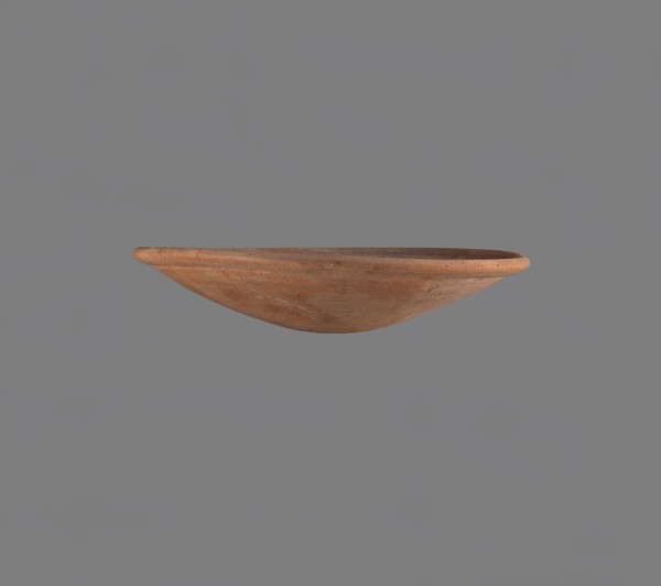 Bowl, Low bowl with a rounded bottom and a widening, rounded rim. Nile clay, fine-grained,