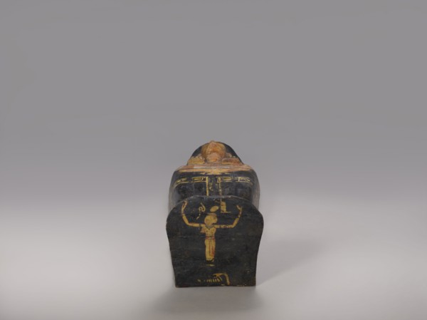 Lid of an anthropoid sarcophagus of a woman with clearly modeled legs. The head is sculpturally