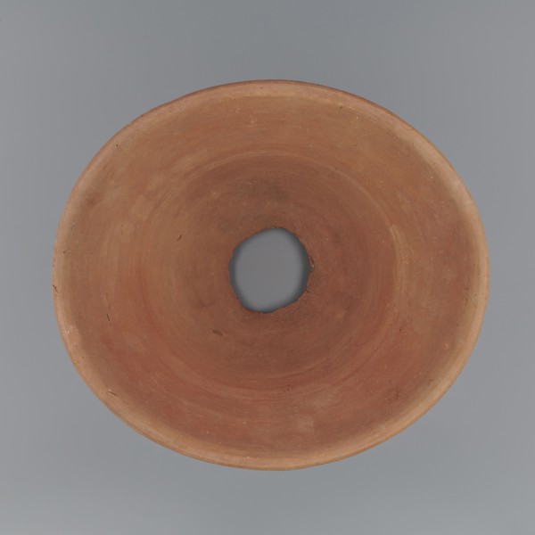 Cake baking mold. A vessel so-called flower pot for baking bread with a conical shape and a flat