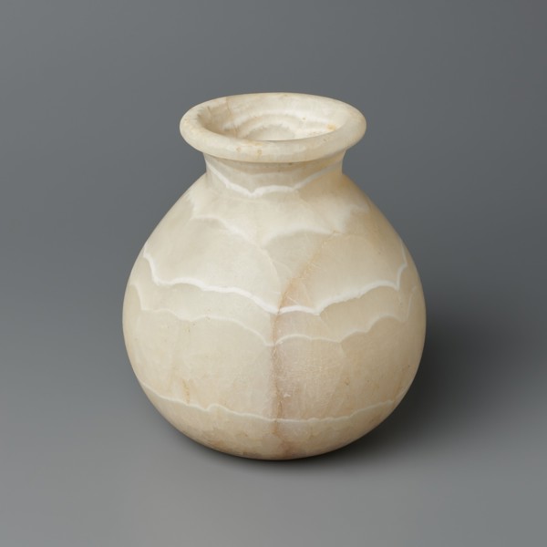 Vessel, unknown creator; globular stone vessel with a short, wide neck and a large upturned spout,