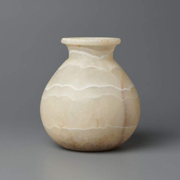 Vessel, globular vessel with a short, wide neck and a large upturned spout, flattened bottom,