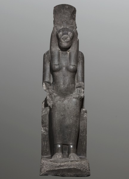 Statue of the goddess Sekhmet. Woman with a lioness's head seated on a throne, dressed in a long