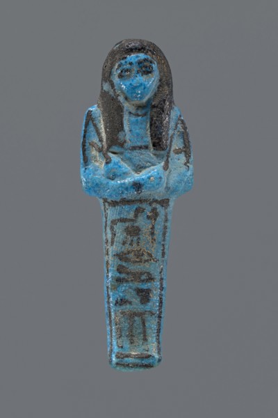 Ushabti Henut-netjeru. Mummy-shaped figurine shabti. Arms crossed on the chest, right folded over