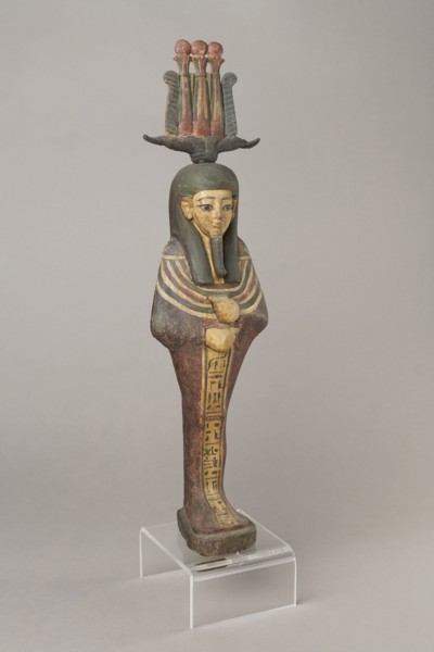 Osiris, Osiris mythology. Figurine in the form of a human mummy wearing a hemhem crown with ram's