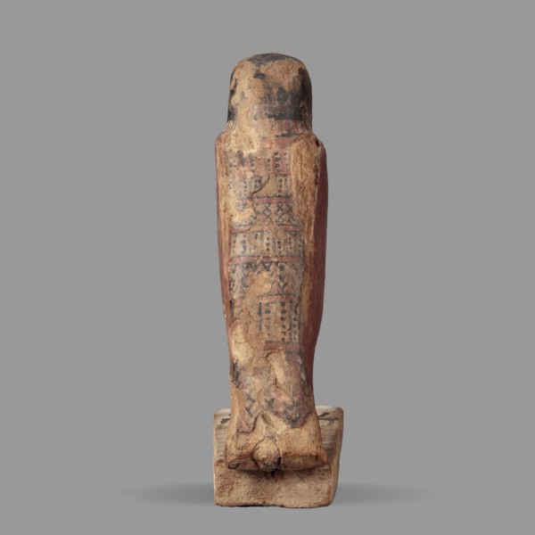 Figurine of the falcon Sokaris, guardian of the necropolis; Horus mythology. A falcon stands on a
