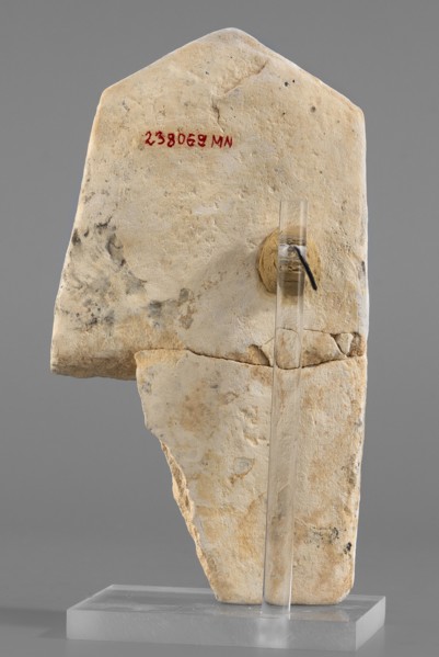Naos stele with a female figure, Small naos-shaped stele, slightly tapered at the top and