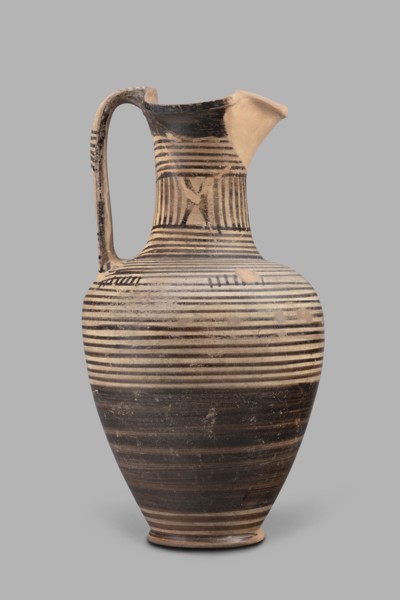 Oinochoe, Geometric oinochoe with a low foot, a gradually widening belly, distinct shoulders, a