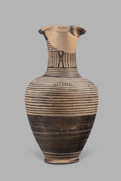 Oinochoe, Geometric oinochoe with a low foot, a gradually widening belly, distinct shoulders, a