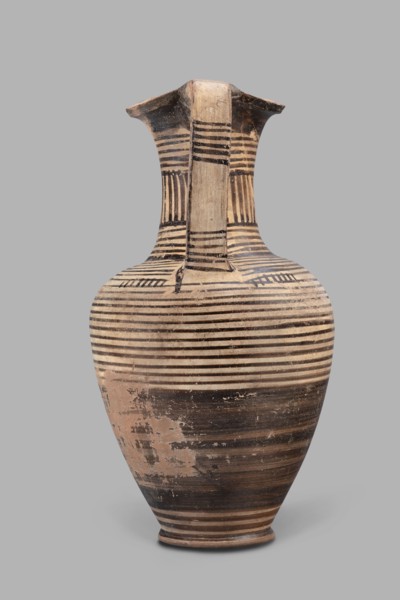 Oinochoe, Geometric oinochoe with a low foot, a gradually widening belly, distinct shoulders, a
