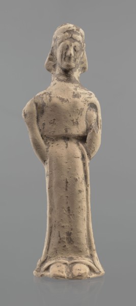 Terracotta figurine of a woman, unknown Boeotian workshop. Mold-pressed terracotta figurine of a