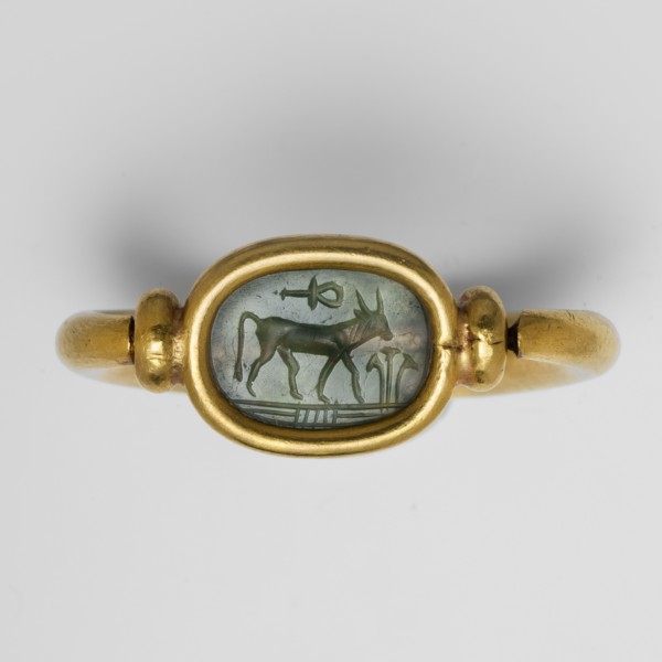 Ring with a scarab and a cryptogram of Amun. Amun mythology, ankh iconography, plant decorations;