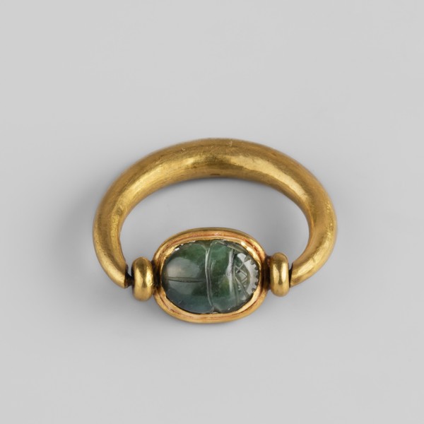 Ring with a scarab and a cryptogram of Amun; Amun mythology, ankh iconography, plant decorations;