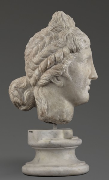 Head of the goddess Aphrodite; creator, Greek sculpture, female portrait; hair tied in a bow at the