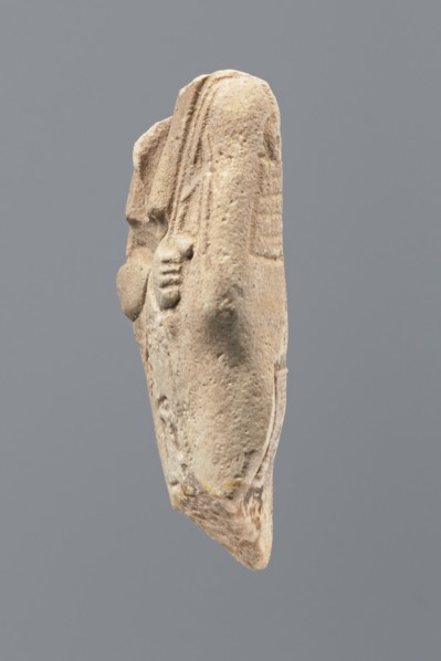 Ushabti - fragment, Mummy-shaped figurine; flat pillar on the back. Preserved central fragment from
