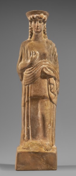 Figurine of a woman with a polos on her head, Tanagra workshop, early 5th century BC circa 480 BC,